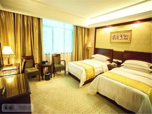Imagen de la habitación del Hotel Vienna International Yangzhou Libao Square. Foto 1