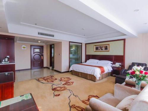 Imagen de la habitación del Hotel Vienna International Yangzhou outlets Plaza Heyuan. Foto 10
