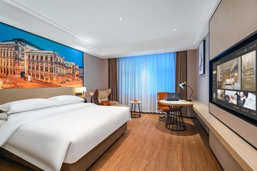 Imagen general del Hotel Vienna International Yichun Wanzai Guomao Branch. Foto 3