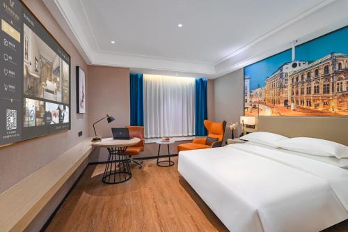 Imagen general del Hotel Vienna International Yichun Wanzai Guomao Branch. Foto 6