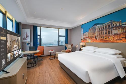 Imagen general del Hotel Vienna International Yichun Wanzai Guomao Branch. Foto 7