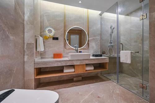 Imagen de la habitación del Hotel Vienna International Yichun Wanzai Guomao Branch. Foto 20