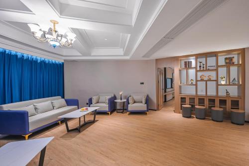 Imagen general del Hotel Vienna International Yichun Wanzai Guomao Branch. Foto 8