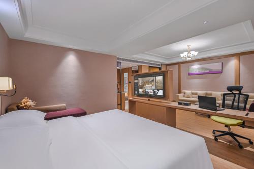 Imagen general del Hotel Vienna International Yichun Wanzai Guomao Branch. Foto 10