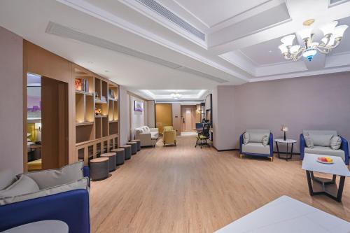 Imagen general del Hotel Vienna International Yichun Wanzai Guomao Branch. Foto 12