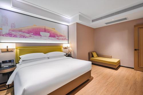 Imagen general del Hotel Vienna International Yichun Wanzai Guomao Branch. Foto 13