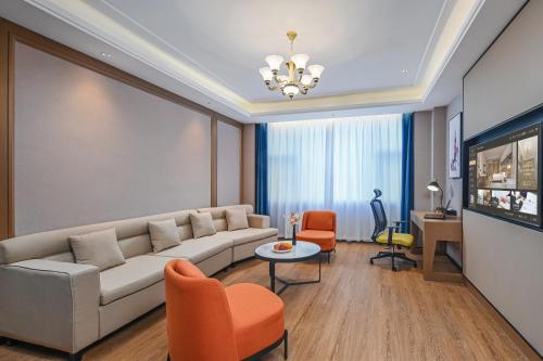 Imagen general del Hotel Vienna International Yichun Wanzai Guomao Branch. Foto 14