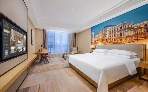 Imagen de la habitación del Hotel Vienna International - Yunfu Century Avenue. Foto 18