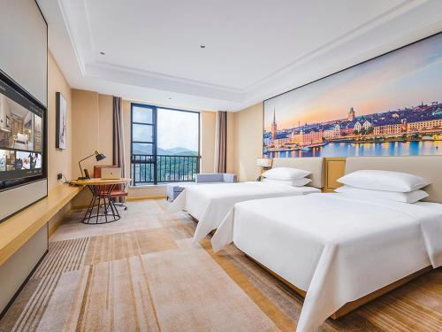 Imagen de la habitación del Hotel Vienna International - Yunfu Century Avenue. Foto 19