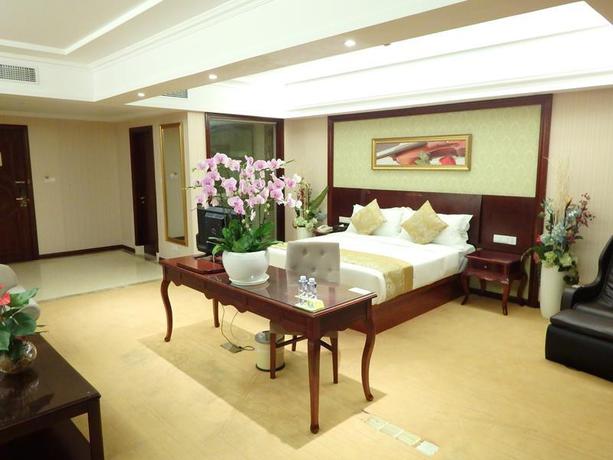 Imagen de la habitación del Hotel Vienna International Zhoupu Wanda Plaza. Foto 2