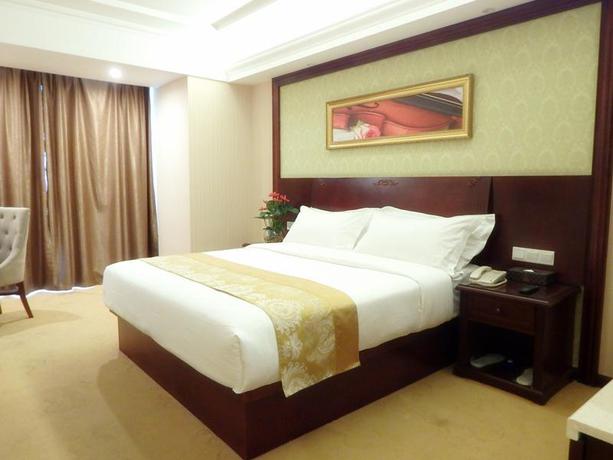 Imagen de la habitación del Hotel Vienna International Zhoupu Wanda Plaza. Foto 3