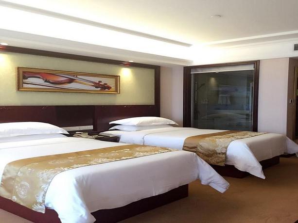Imagen de la habitación del Hotel Vienna International Zhoupu Wanda Plaza. Foto 4