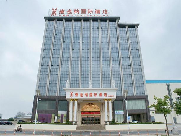 Imagen de la habitación del Hotel Vienna International Zhoupu Wanda Plaza. Foto 6