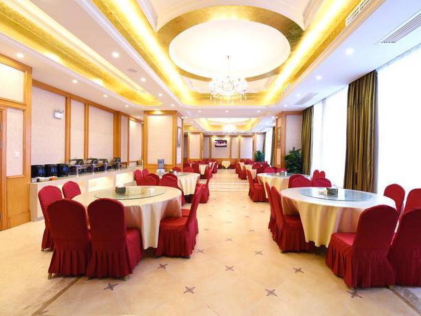 Imagen de la habitación del Hotel Vienna International Zhoupu Wanda Plaza. Foto 8