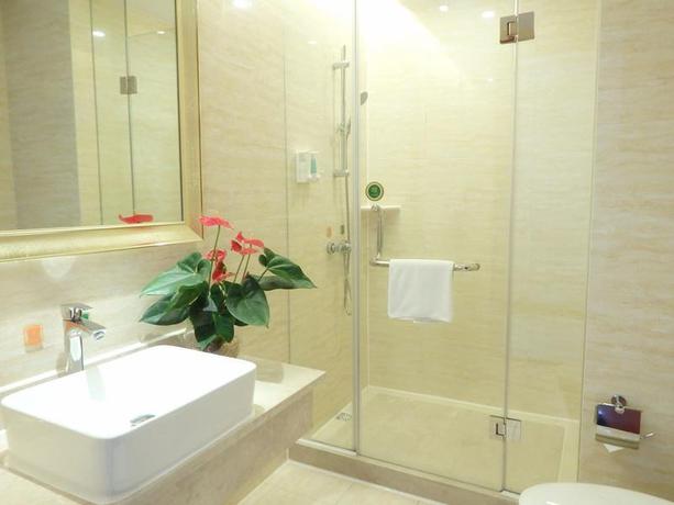 Imagen de la habitación del Hotel Vienna International Zhoupu Wanda Plaza. Foto 10