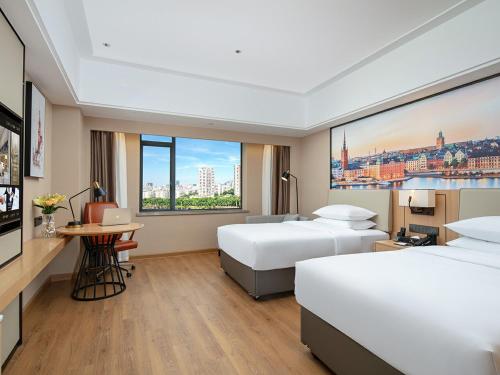 Imagen general del Hotel Vienna International Zhuhai Gongbei Port Fuhuali Branch. Foto 18