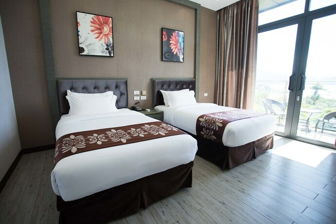 Imagen de la habitación del Hotel Vienna, Isla Sangat. Foto 14