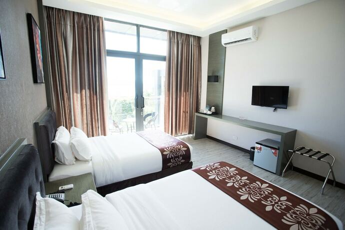 Imagen de la habitación del Hotel Vienna, Isla Sangat. Foto 22