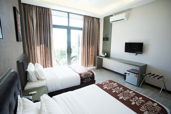 Imagen de la habitación del Hotel Vienna, Isla Sangat. Foto 25