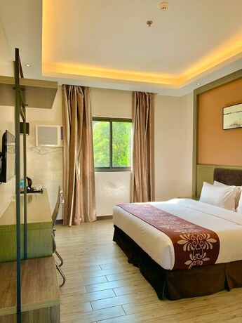 Imagen de la habitación del Hotel Vienna, Isla Sangat. Foto 26