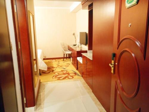 Imagen de la habitación del Hotel Vienna Jian People Square. Foto 9