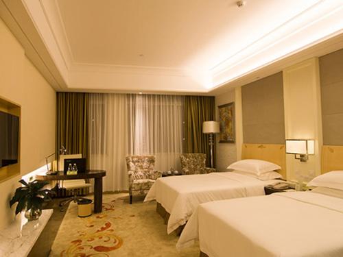 Imagen de la habitación del Hotel Vienna Jiangmen Heshan Huamao. Foto 5