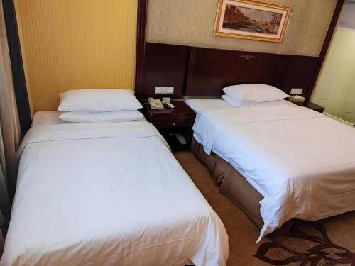 Imagen de la habitación del Hotel Vienna Jiangsu Yangzhou Shouxihu Wenchangge. Foto 17