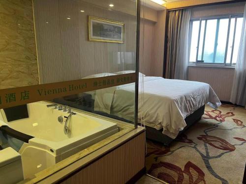 Imagen de la habitación del Hotel Vienna Jiangsu Yangzhou Shouxihu Wenchangge. Foto 19