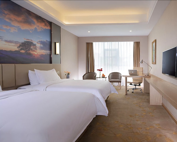 Imagen de la habitación del Hotel Vienna Jinshan Road Yiyang. Foto 18