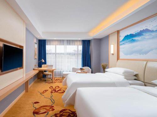 Imagen de la habitación del Hotel Vienna Lukou Airport. Foto 13
