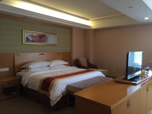 Imagen de la habitación del Hotel Vienna Qidong South Gongyuan Road. Foto 7