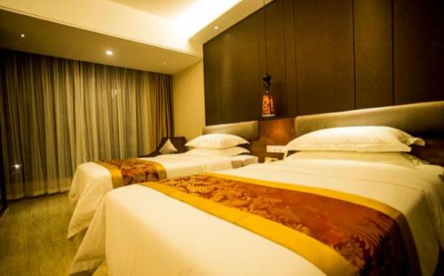 Imagen de la habitación del Hotel Vienna Sanya Sanya Bay. Foto 7