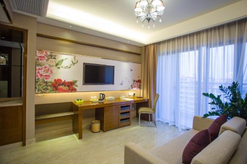 Imagen de la habitación del Hotel Vienna Sanya Sanya Bay. Foto 8
