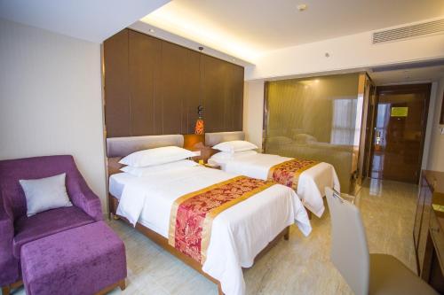 Imagen de la habitación del Hotel Vienna Sanya Sanya Bay. Foto 10