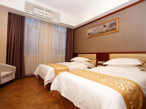Imagen de la habitación del Hotel Vienna Shanghai Baoshan Wusong. Foto 6