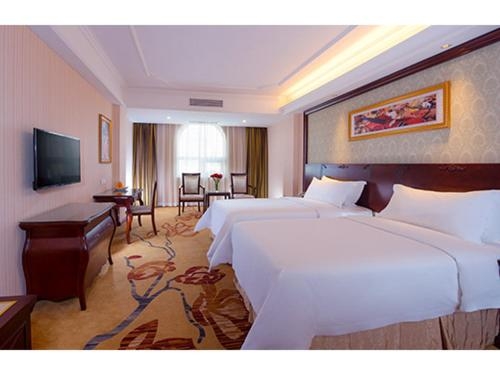 Imagen de la habitación del Hotel Vienna Shanghai Baoshan Wusong. Foto 7