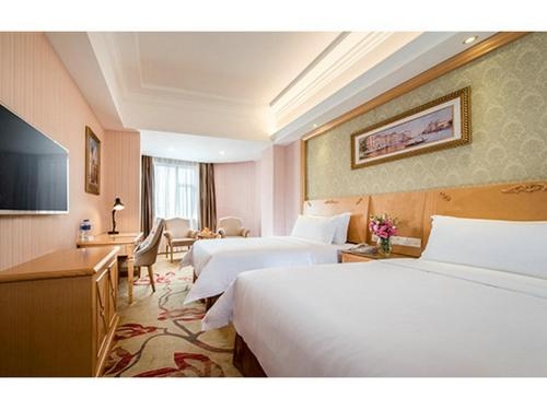 Imagen de la habitación del Hotel Vienna Shanghai Baoshan Wusong. Foto 8