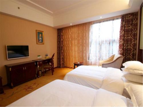 Imagen de la habitación del Hotel Vienna Shanghai Songjiang Wanda. Foto 7