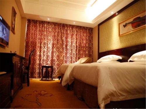 Imagen de la habitación del Hotel Vienna Shanghai Songjiang Wanda. Foto 8