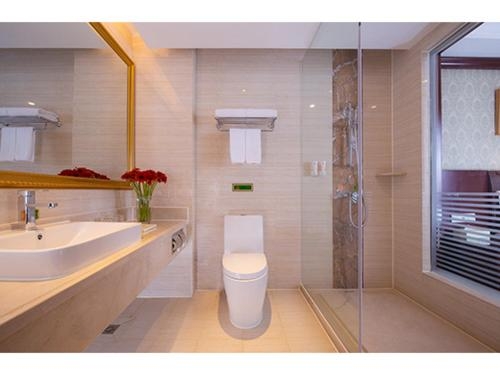 Imagen de la habitación del Hotel Vienna Shanghai Yangpu Wujiaochang. Foto 9
