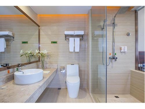 Imagen de la habitación del Hotel Vienna Shanghai Yangpu Wujiaochang. Foto 10