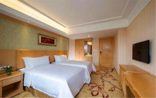 Imagen de la habitación del Hotel Vienna Shenzhen East Railway Station. Foto 3