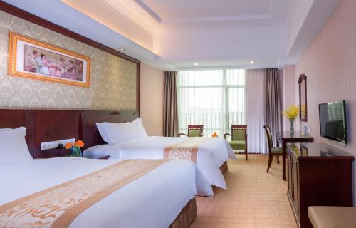 Imagen de la habitación del Hotel Vienna Shenzhen Fuyong Qiaotou. Foto 10