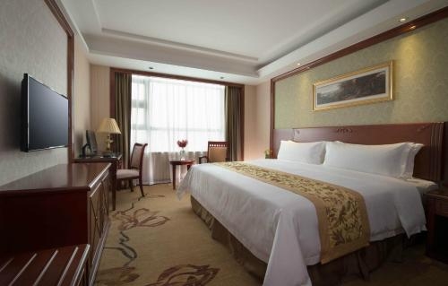 Imagen de la habitación del Hotel Vienna Shenzhen Fuyong Xintian. Foto 10