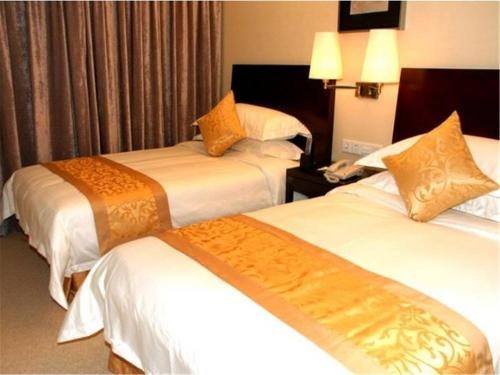 Imagen de la habitación del Hotel Vienna Shenzhen Henggang New City. Foto 5
