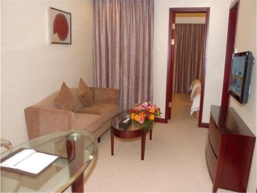 Imagen de la habitación del Hotel Vienna Shenzhen Henggang New City. Foto 6