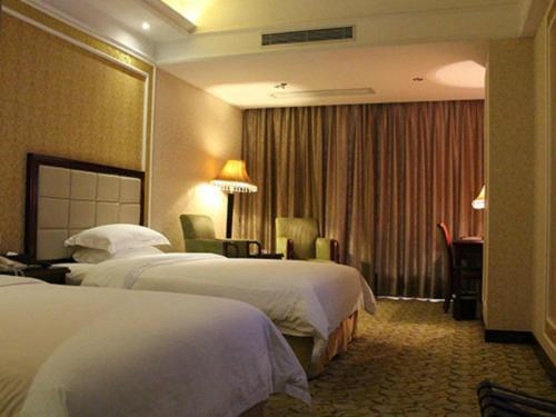 Imagen de la habitación del Hotel Vienna Songgang Yanchuan Road. Foto 7