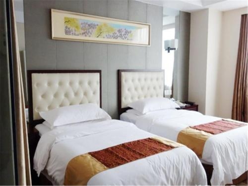 Imagen de la habitación del Hotel Vienna Songjiang Xin Qiao. Foto 8