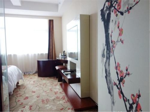Imagen general del Hotel Vienna Songjiang Xin Qiao. Foto 4
