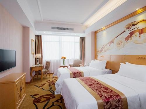 Imagen de la habitación del Hotel Vienna Tianbao Road. Foto 4